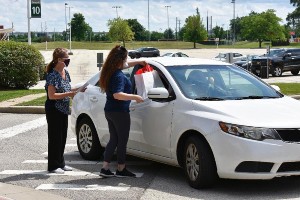 Cap & Gown Curbside Pickup 1